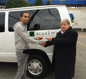 Carlos Soto presents Cummings Properties gift to Executive Director Sean O’Neil